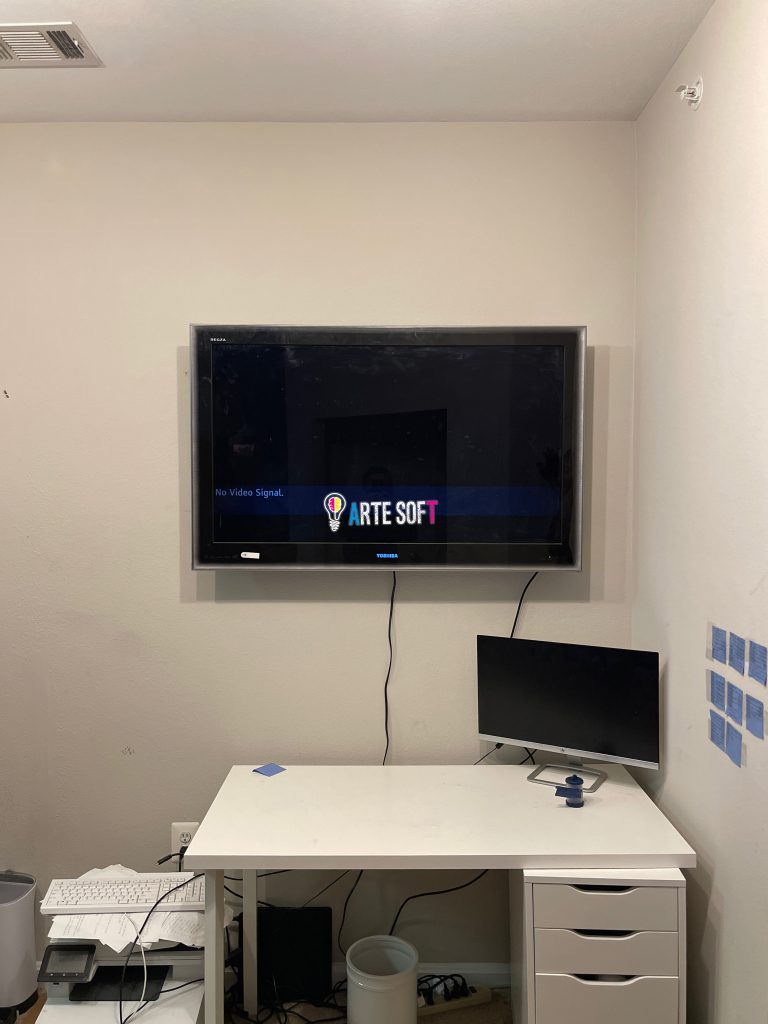 tv mounting with cords showing