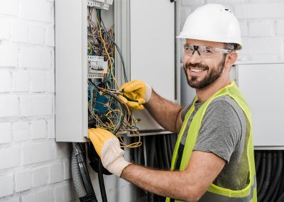Electrician checking the electrical panel of a home